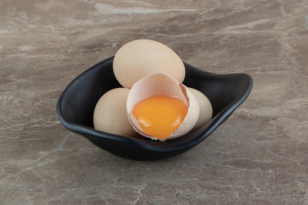 cracked raw egg black bowl 114579 50133