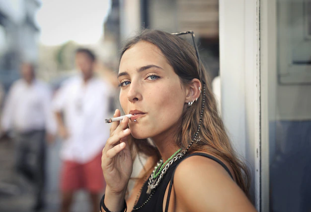 portrait young female smoking street 181624 14121