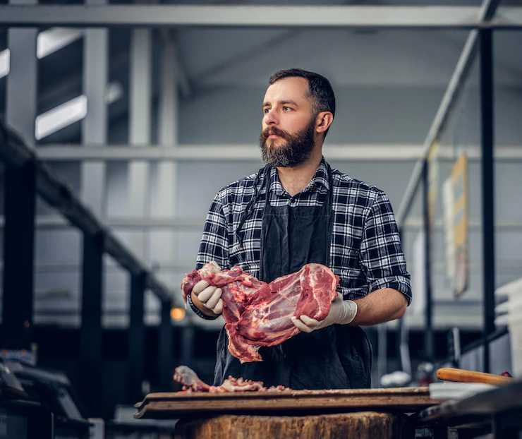 portrait bearded meat man dressed fleece shirt holds fresh cut meat market 613910 16103